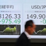 東京株、９７５円下落　「日銀ショック」で全面安―円相場、一時１４８円台半ば